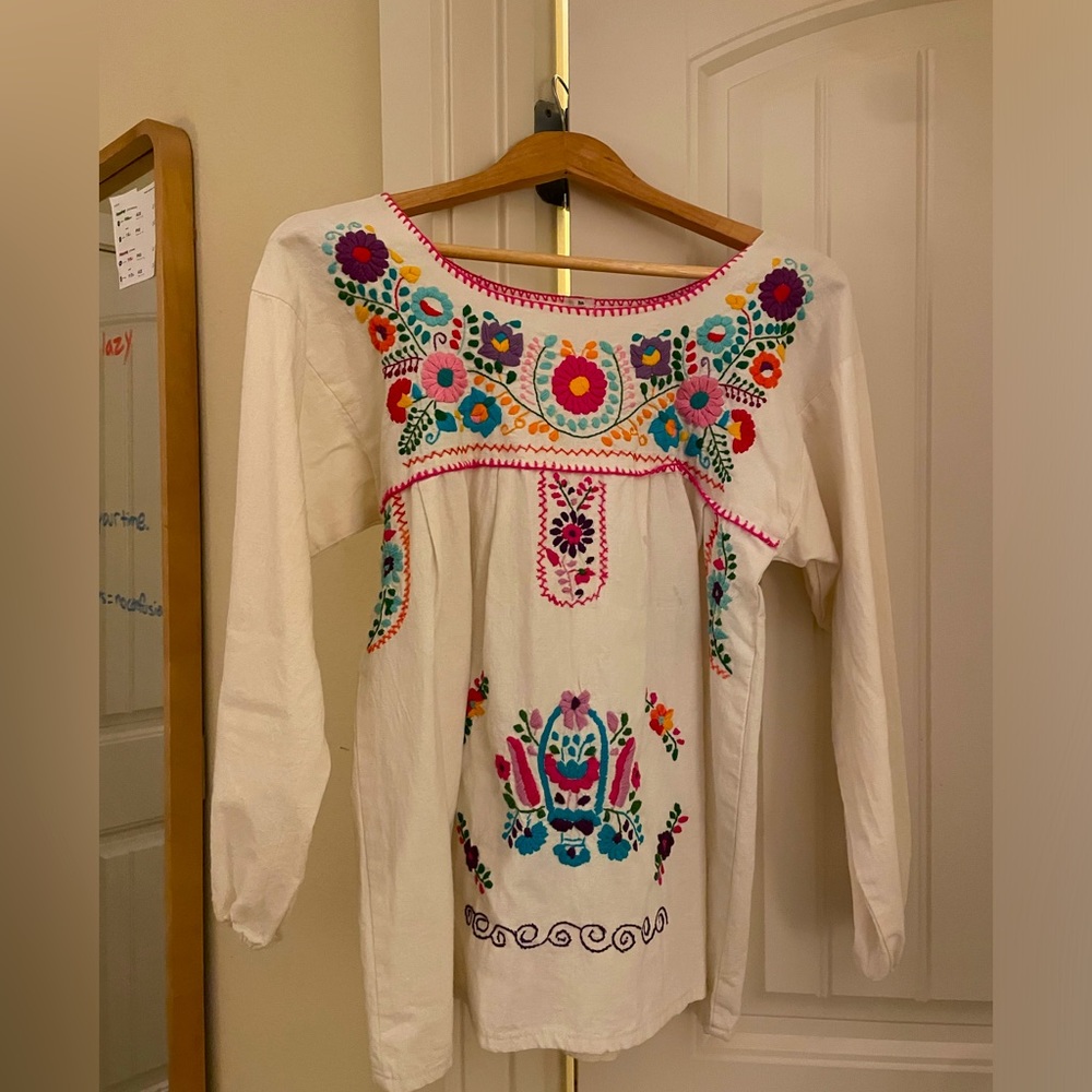 Traditional Mexican embroidered blouse. 100% cotton and hand made from Mexico.
